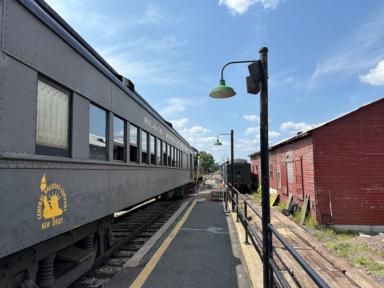 Passenger car along station platform at Ringoes Station.