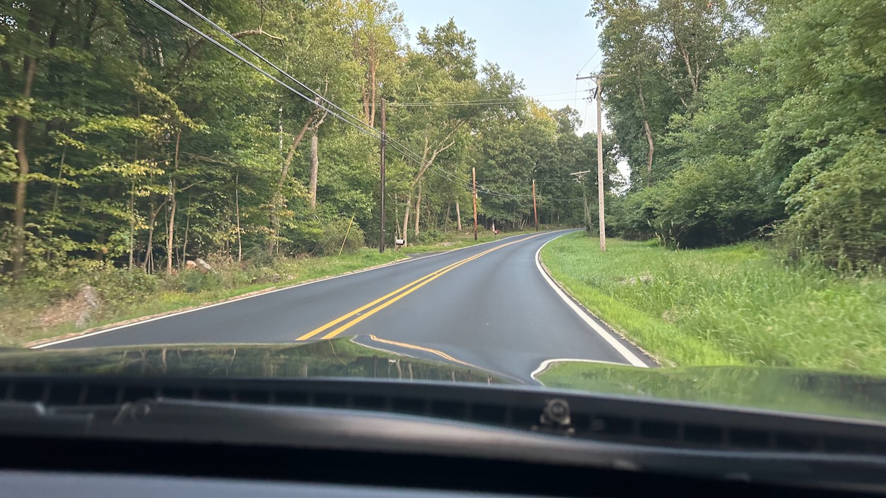 View of curving two lane road.