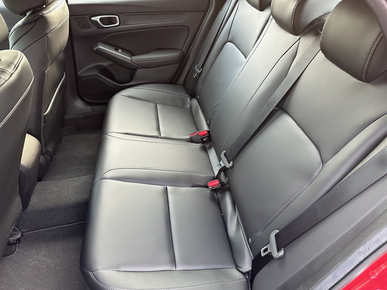 Rear seat of Acura Integra.
