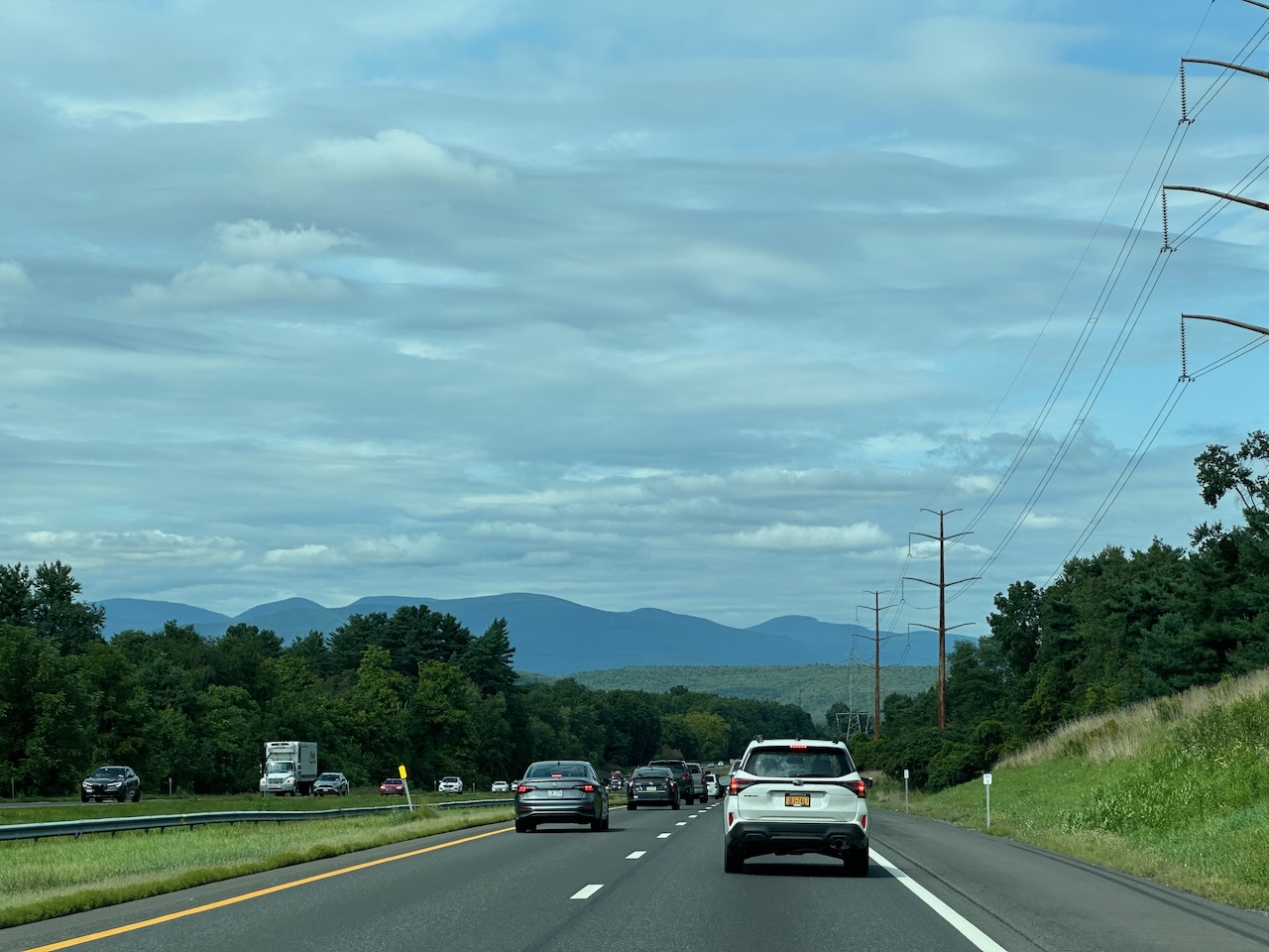 View of I-87, with mountains in distance.