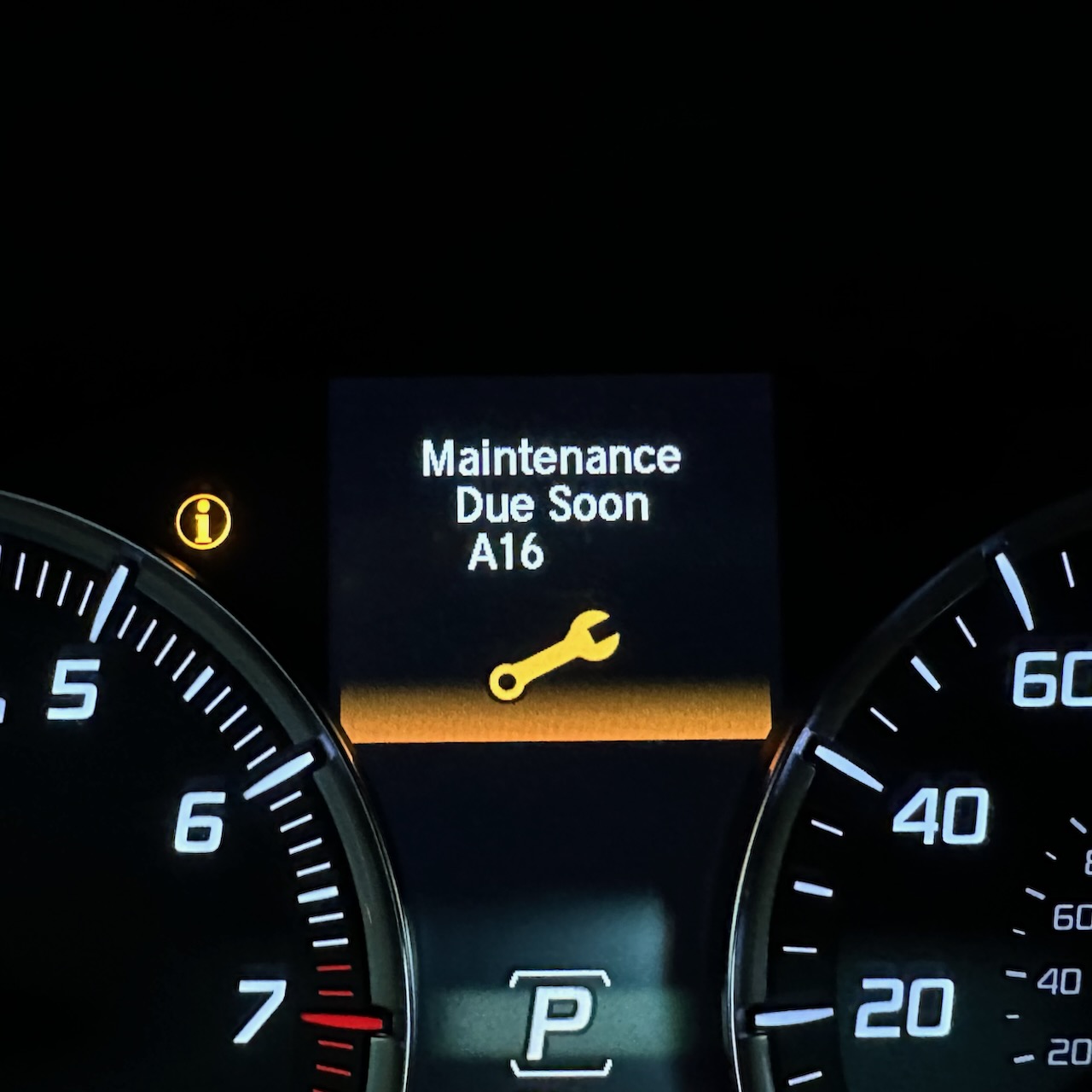 Maintenance minder indicator on Acura TLX gauge cluster.