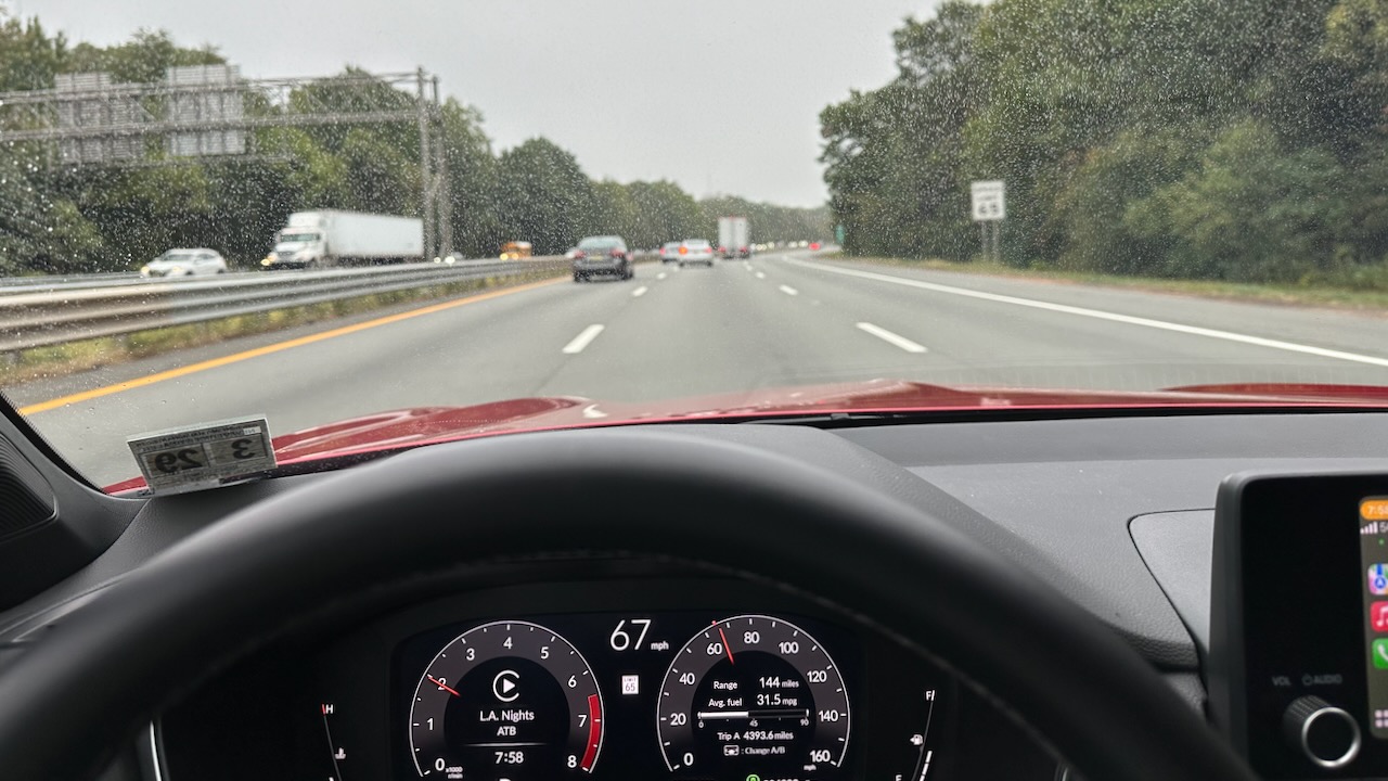 View of I-287 through windshield of Acura Integra.