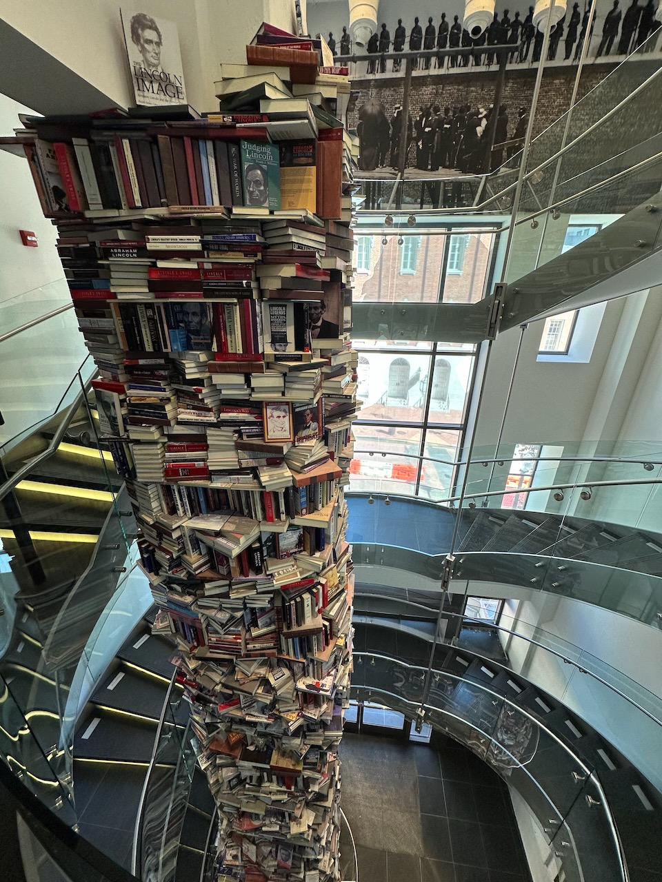 Three-story tower of books.