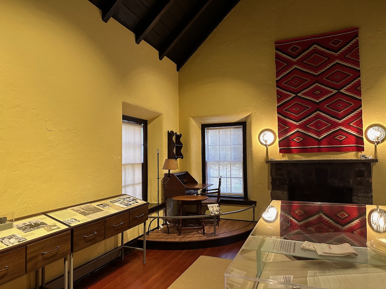 Interior of Val-Kill Cottage, with museum exhibits posted regarding Val-Kill Industries.