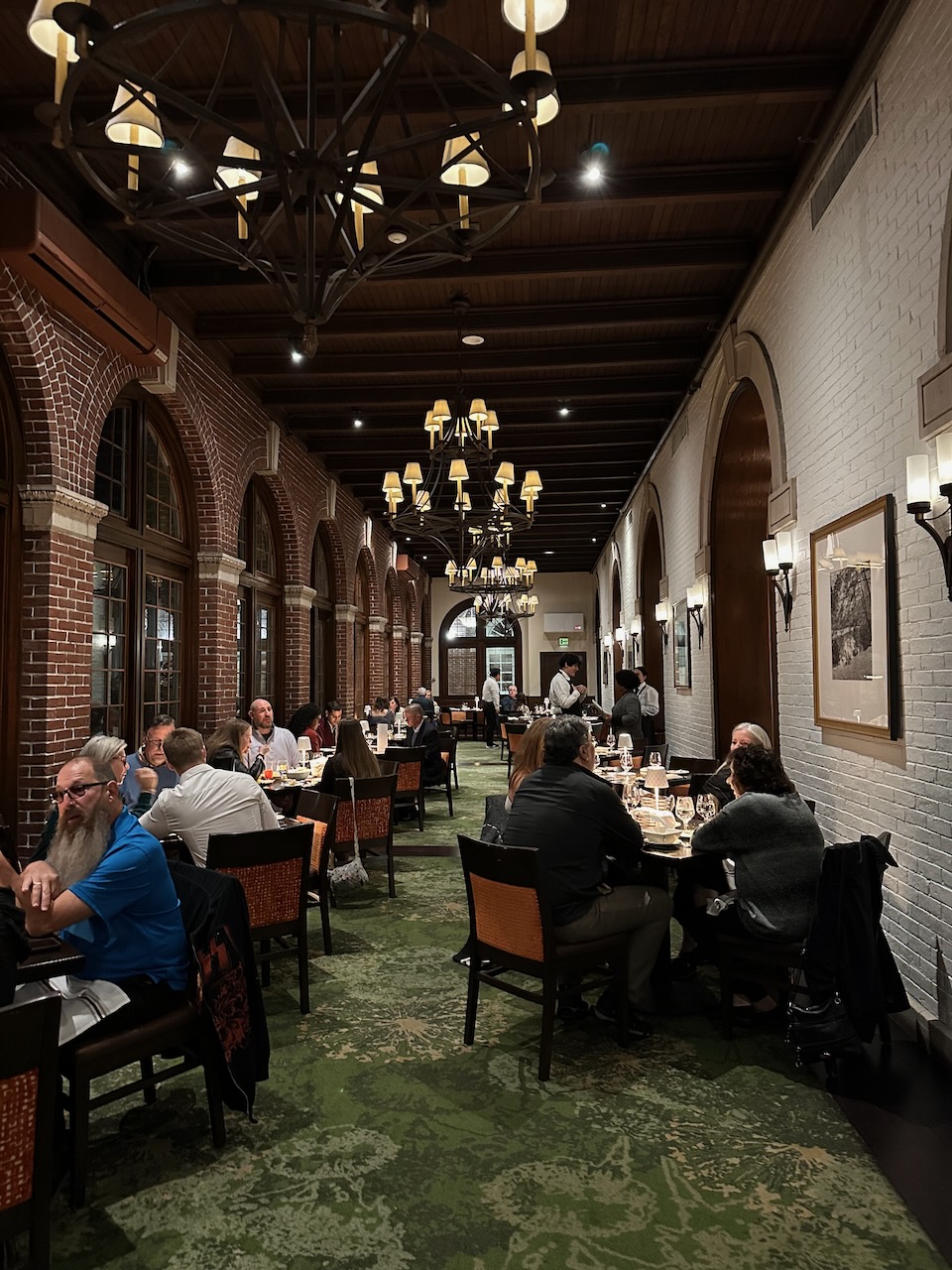 Interior of American Bounty Restaurant, with diners eating at tables.