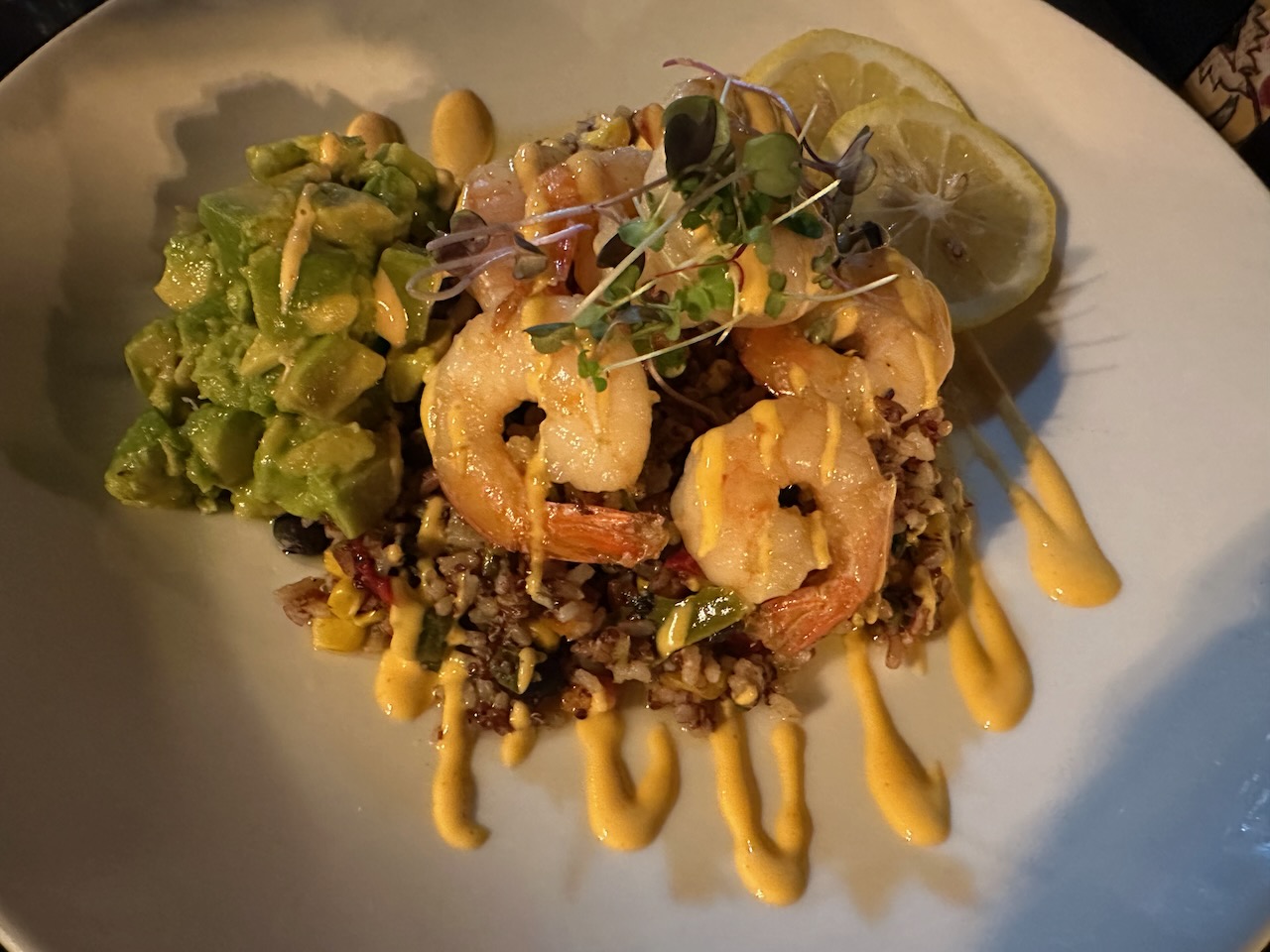 Shrimp and wild rice on plate.