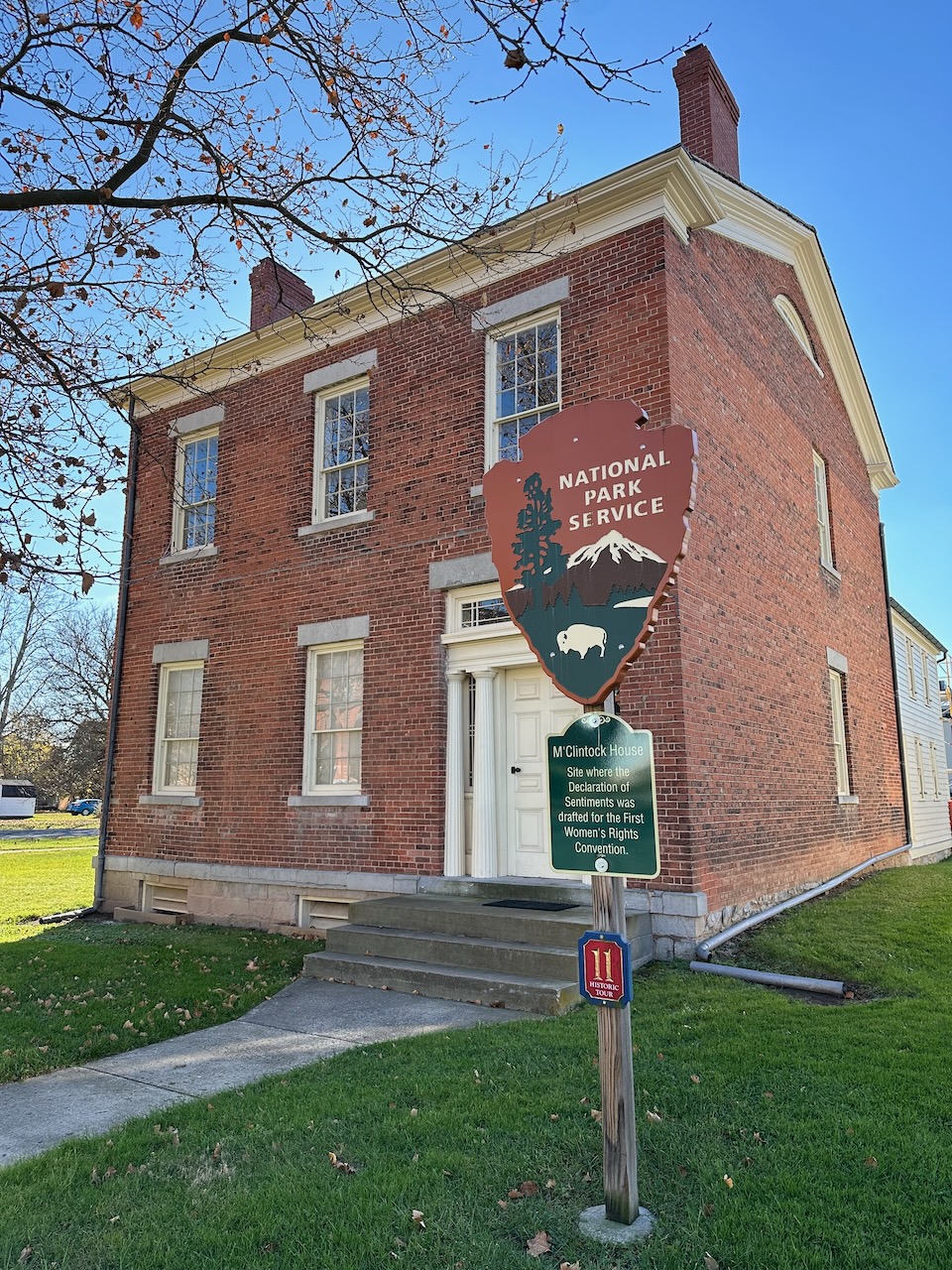 Exterior of McClintock home, with National Park Service sign in front yard.