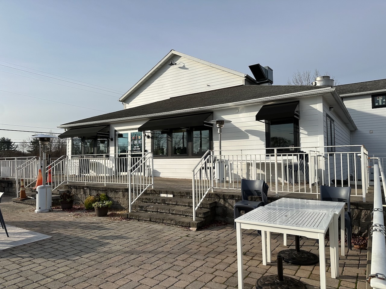 Exterior of At Long Last restaurant.