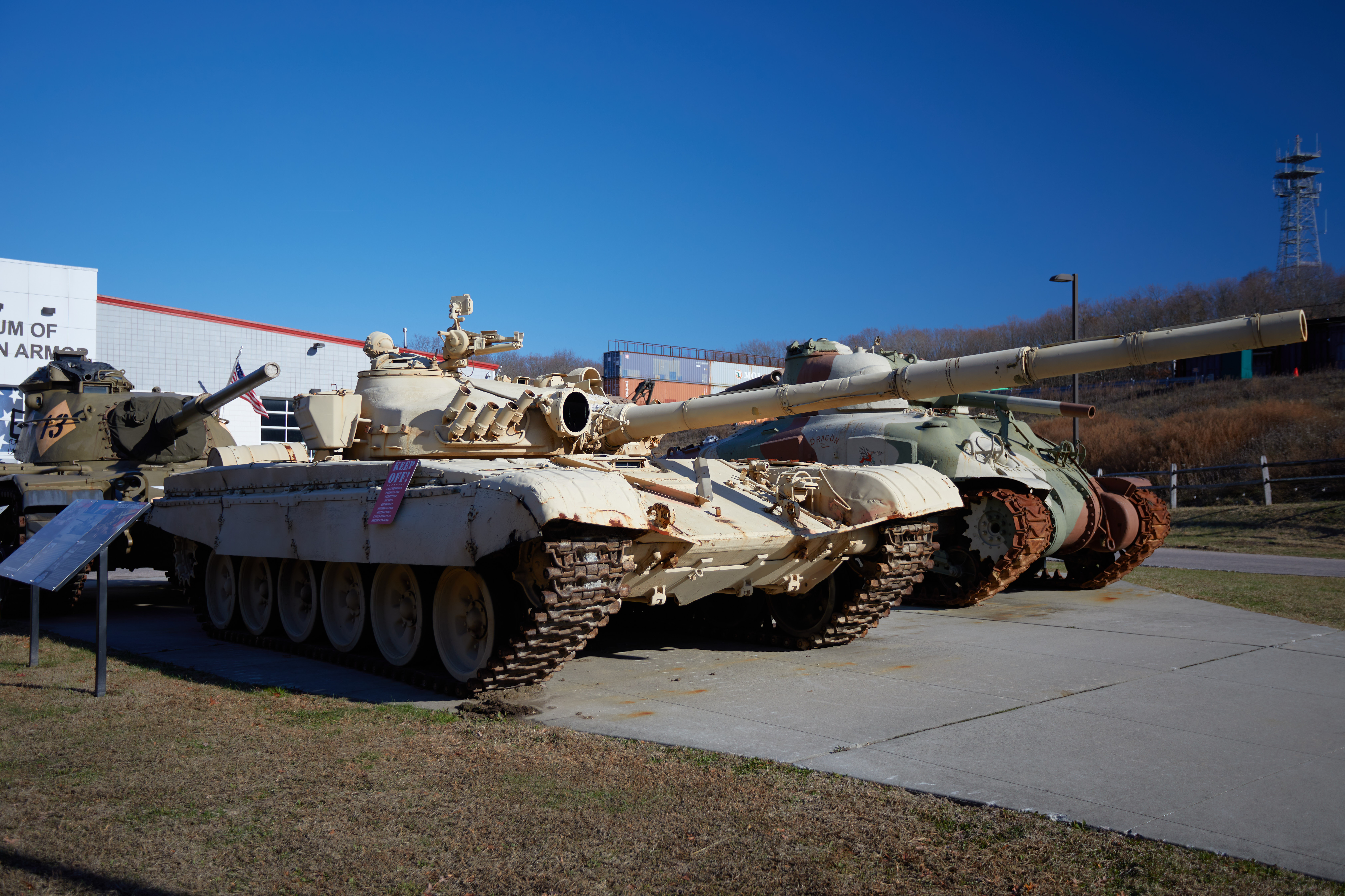 T-72 tank, surrounded by M4 Sherman and M60 Patton tanks.