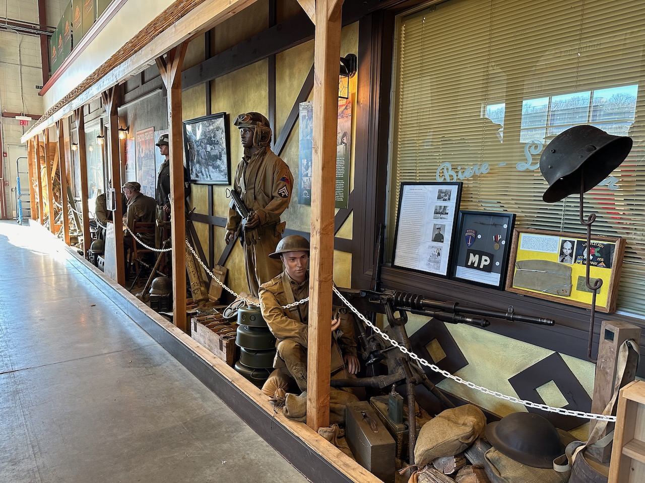 Diorama of US soldiers occupying building in European Theater in WWII.