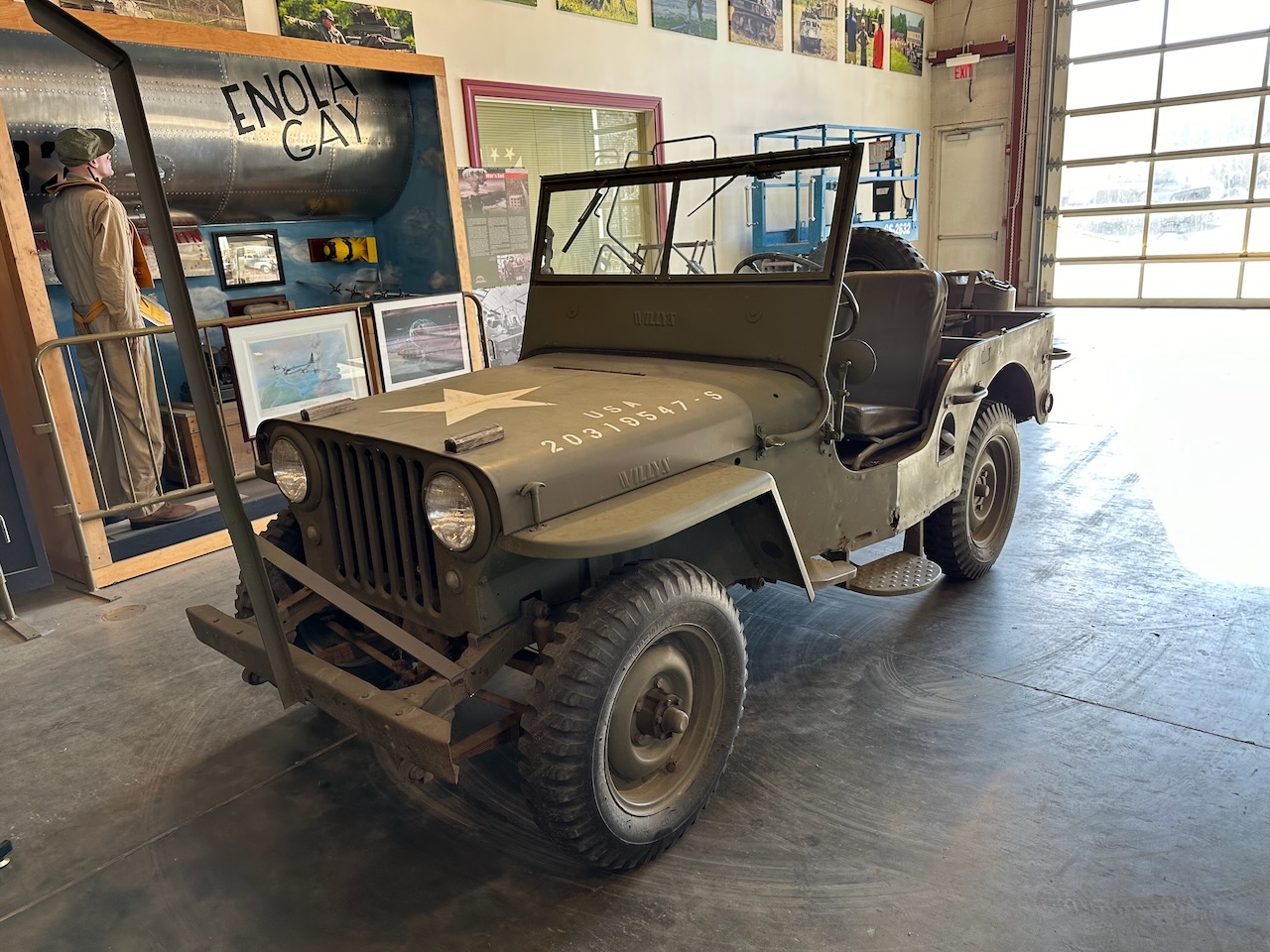 Willy's Jeep, with display about Enola Gay in background.
