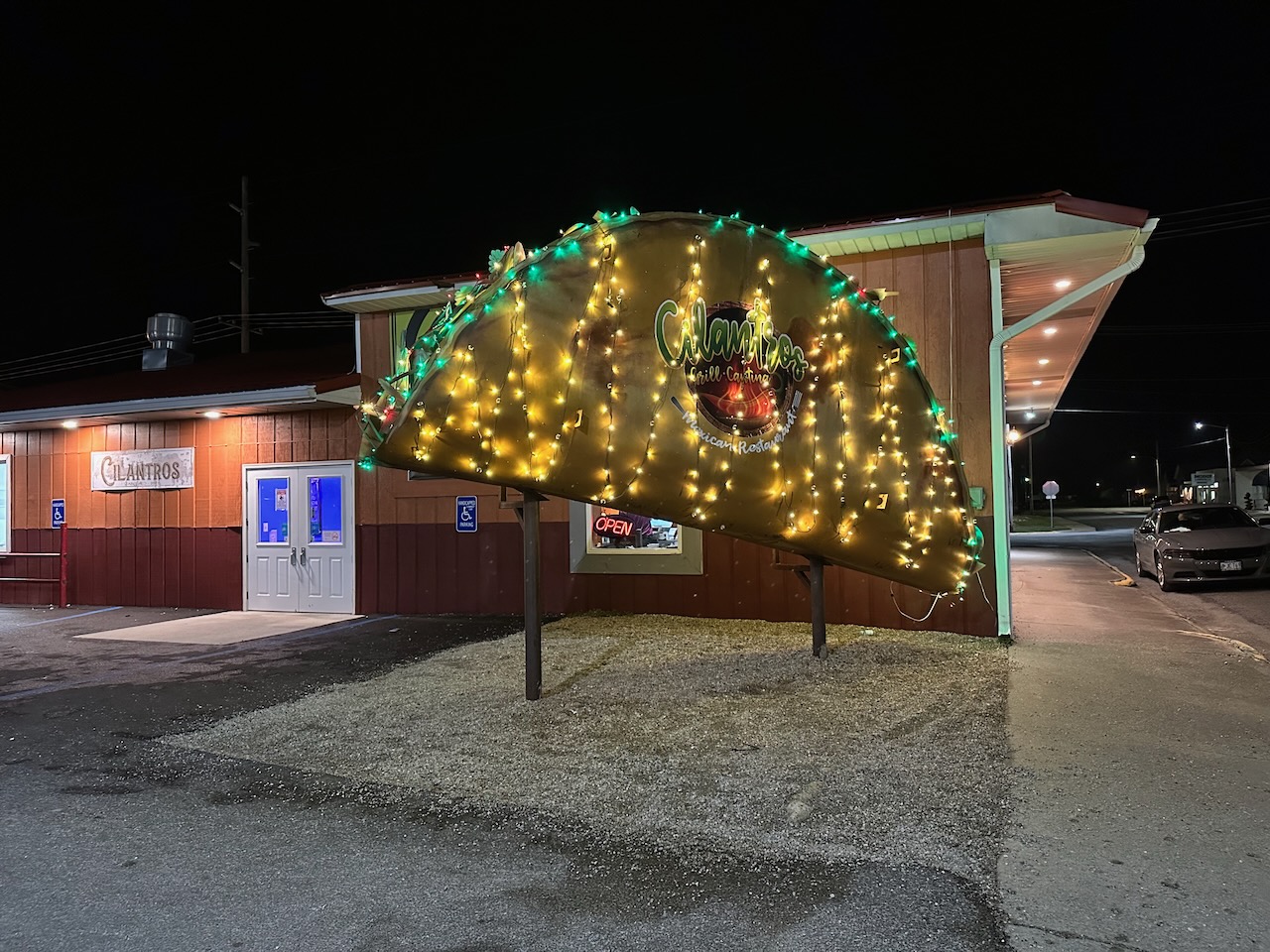 Large taco outside of Cilantros Mexican Restaurant.