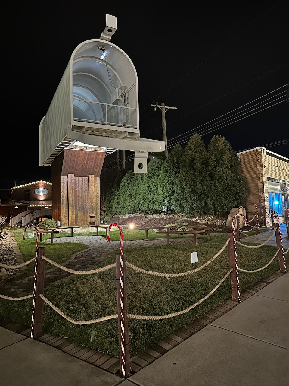 World's Largest Mailbox with a small park in foreground.