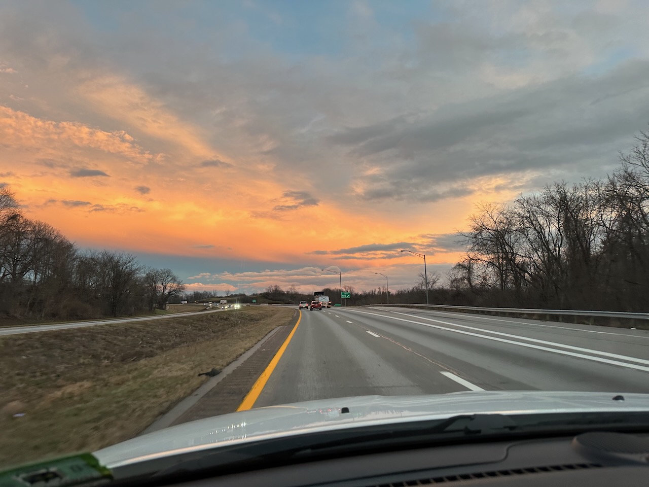 View of sunset sky over I-70.