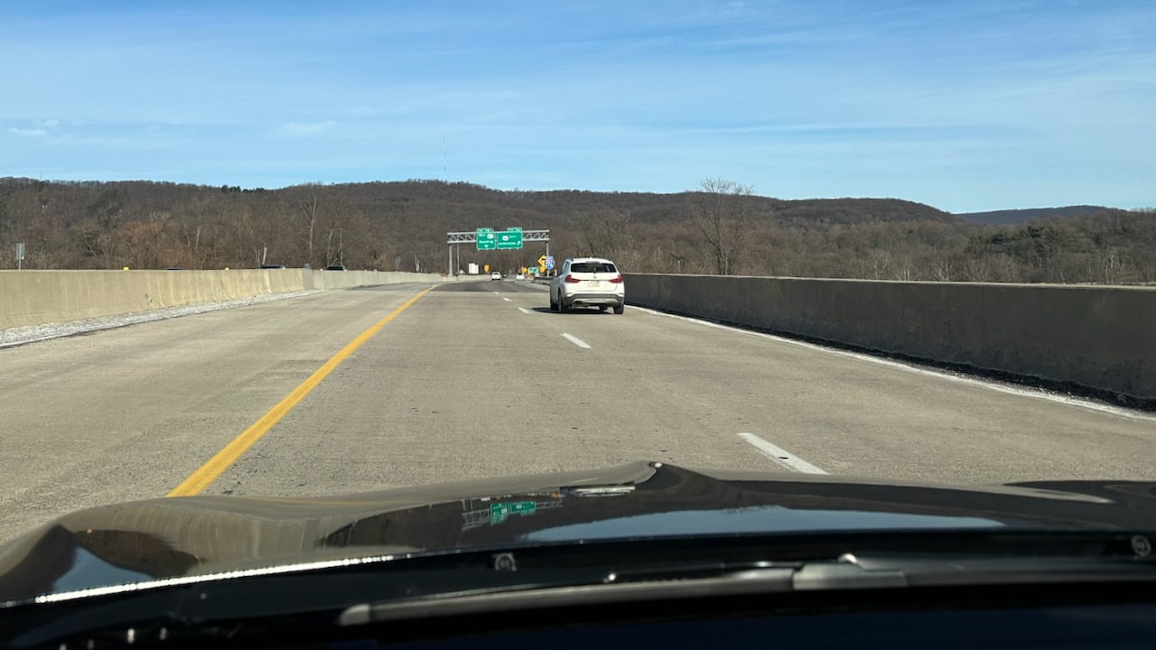 View of I-176 with mountains in distance.