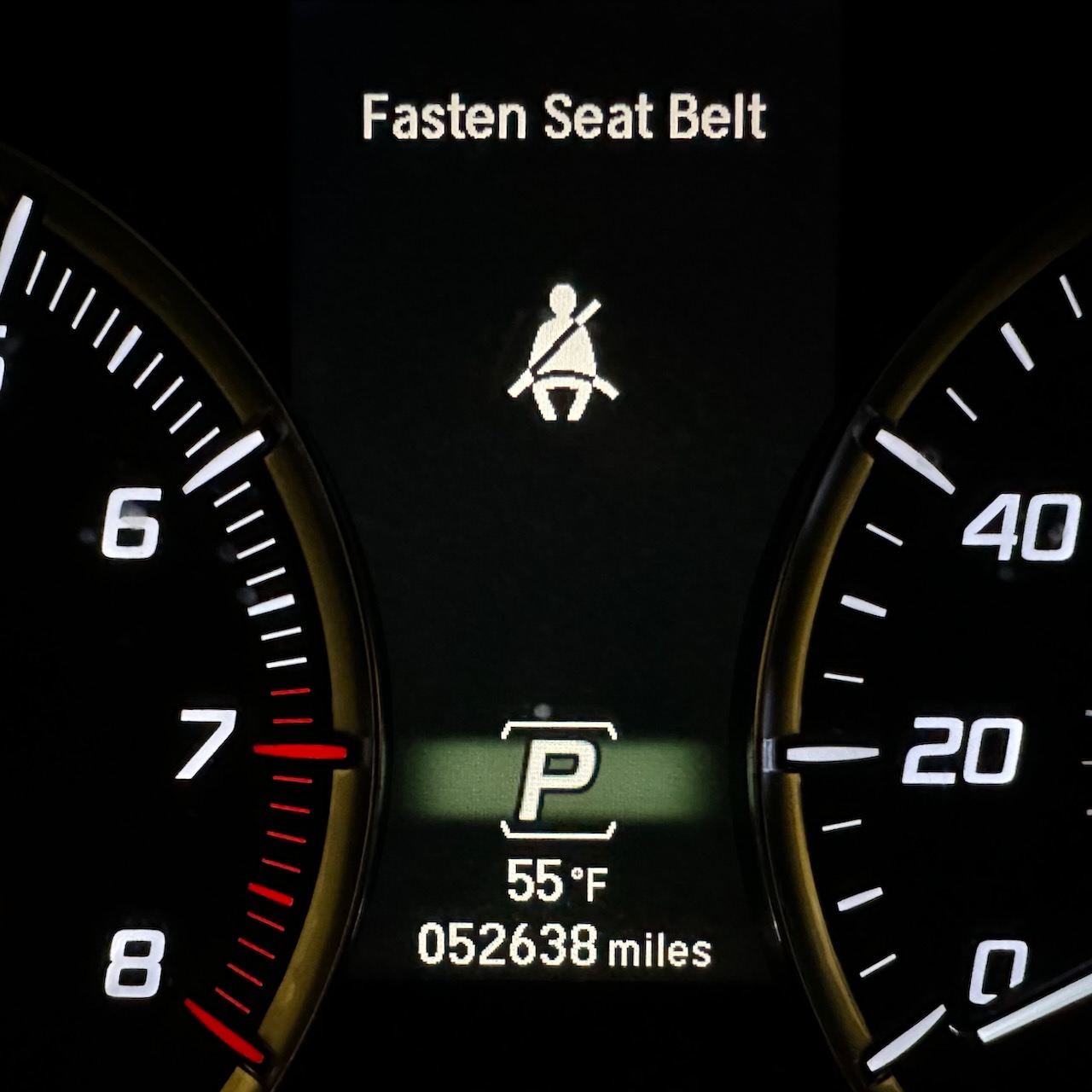 Car odometer reading 52638 miles. 