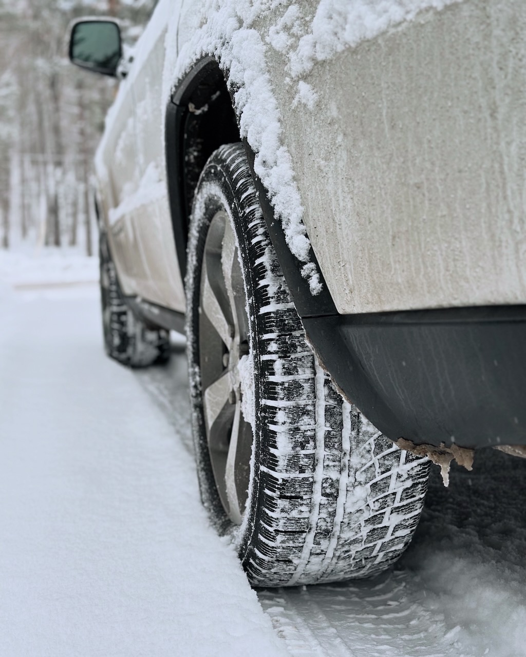 Nokian WR G4 SUV tires in snow. The tires are on a Jeep Grand Cherokee. 
