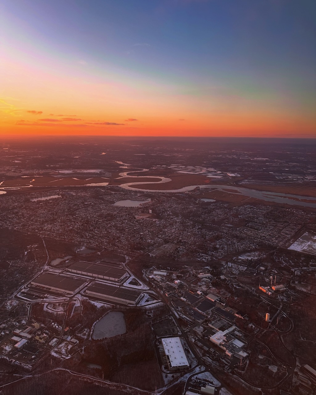 View of Passaic River and town in northern New Jersey and sunset. 