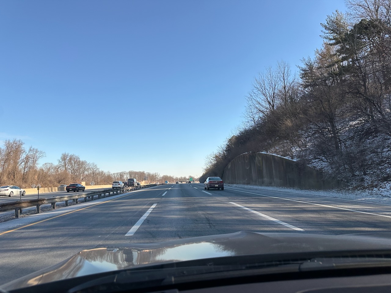 View of highway with blue skies. 