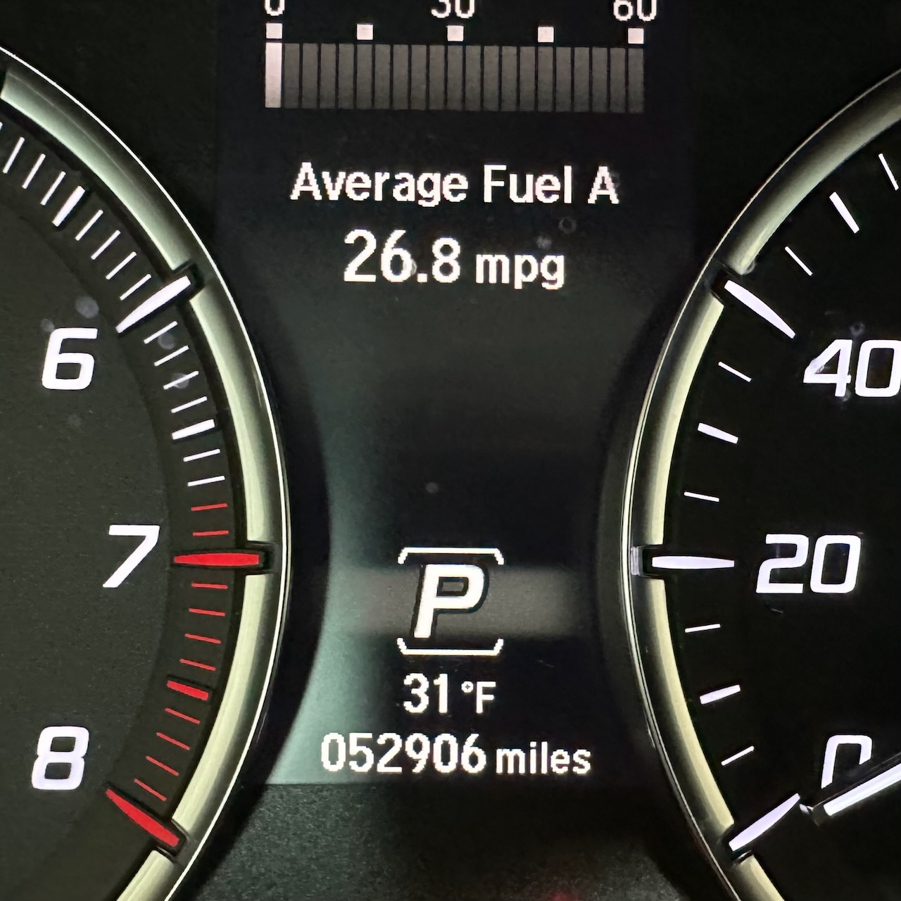 Car odometer reading 52906 miles. 