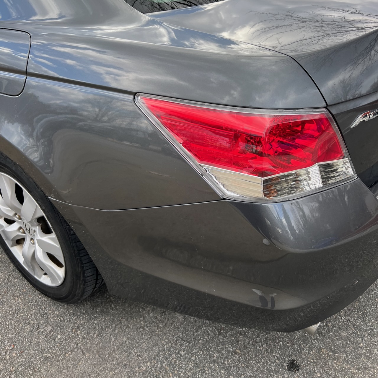 Left rear quarter of 2010 Honda Accord. 