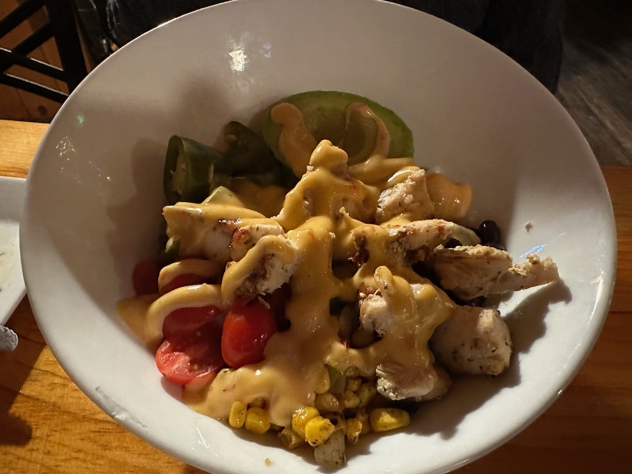 Rice bowl coated in sauce. 