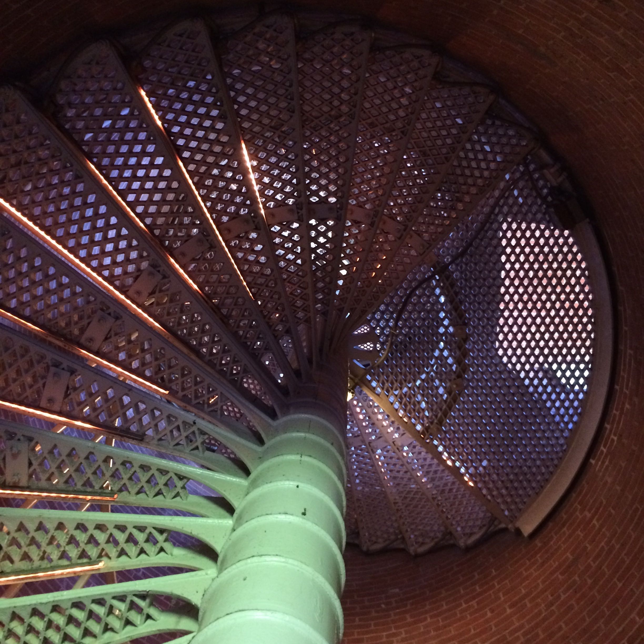 Upward view of lighthouse stairs. 