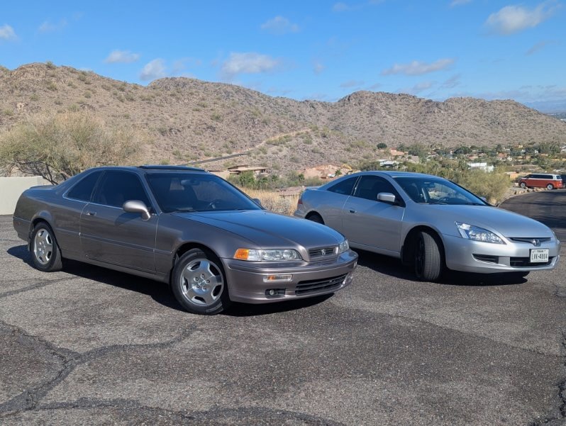 1994 Acura Legend and 2003 Honda Accord coupe parked together. 