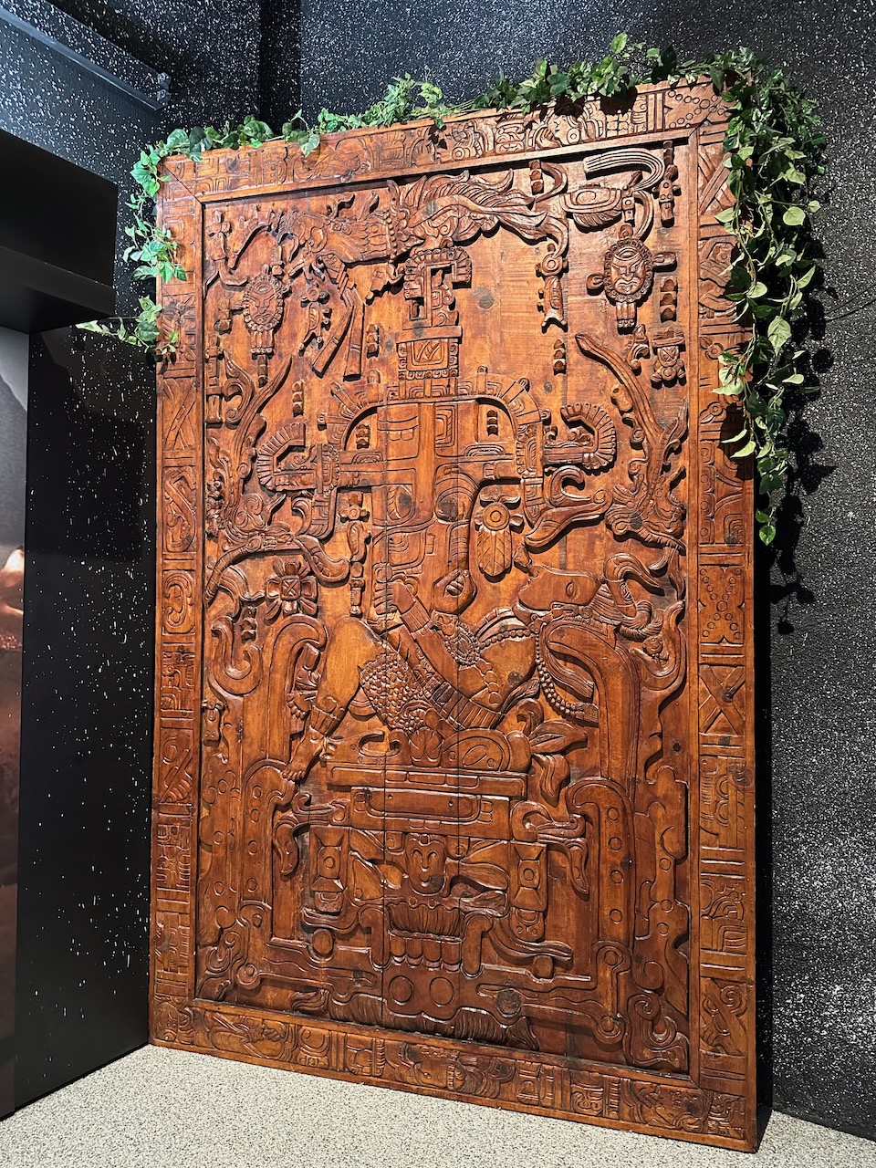 Reproduction of wooden tomb lid from Mayan tomb. 