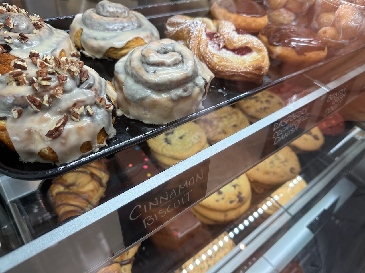 Desserts in glass display case. 