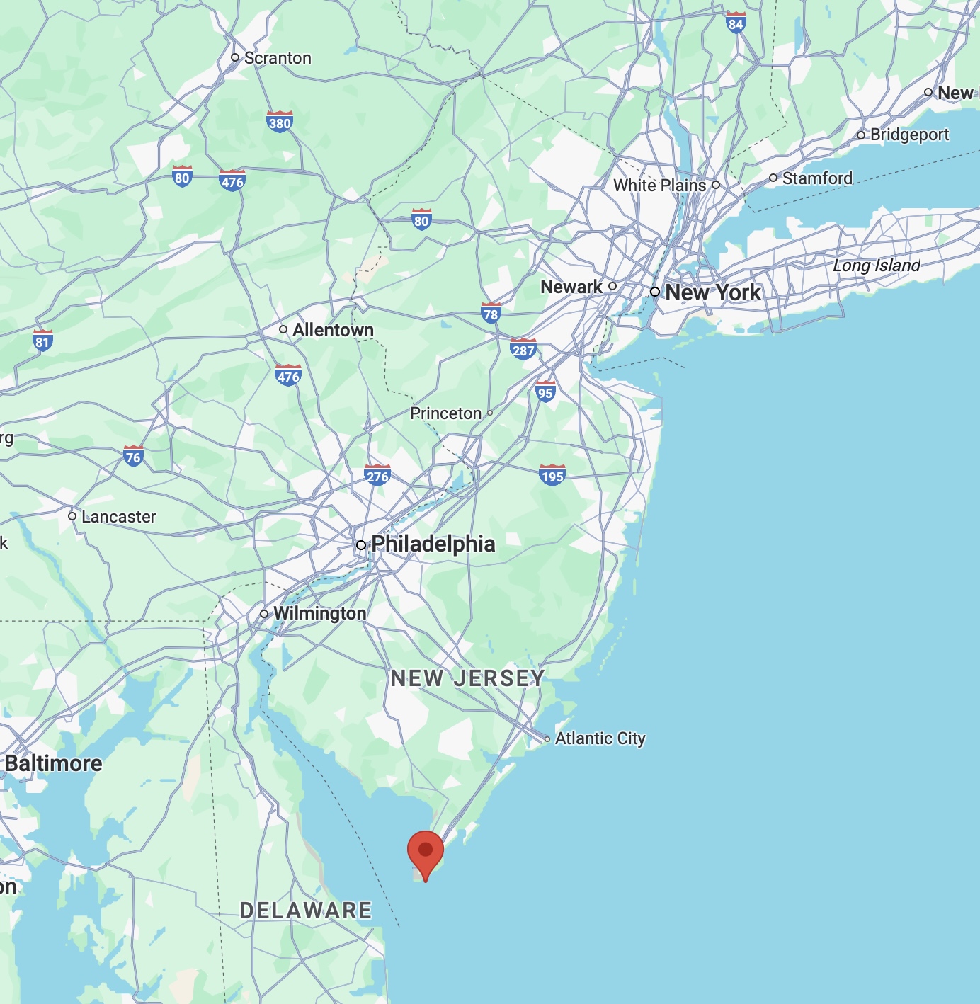 Map of New Jersey with red pin in location of Cape May at southern tip of state.