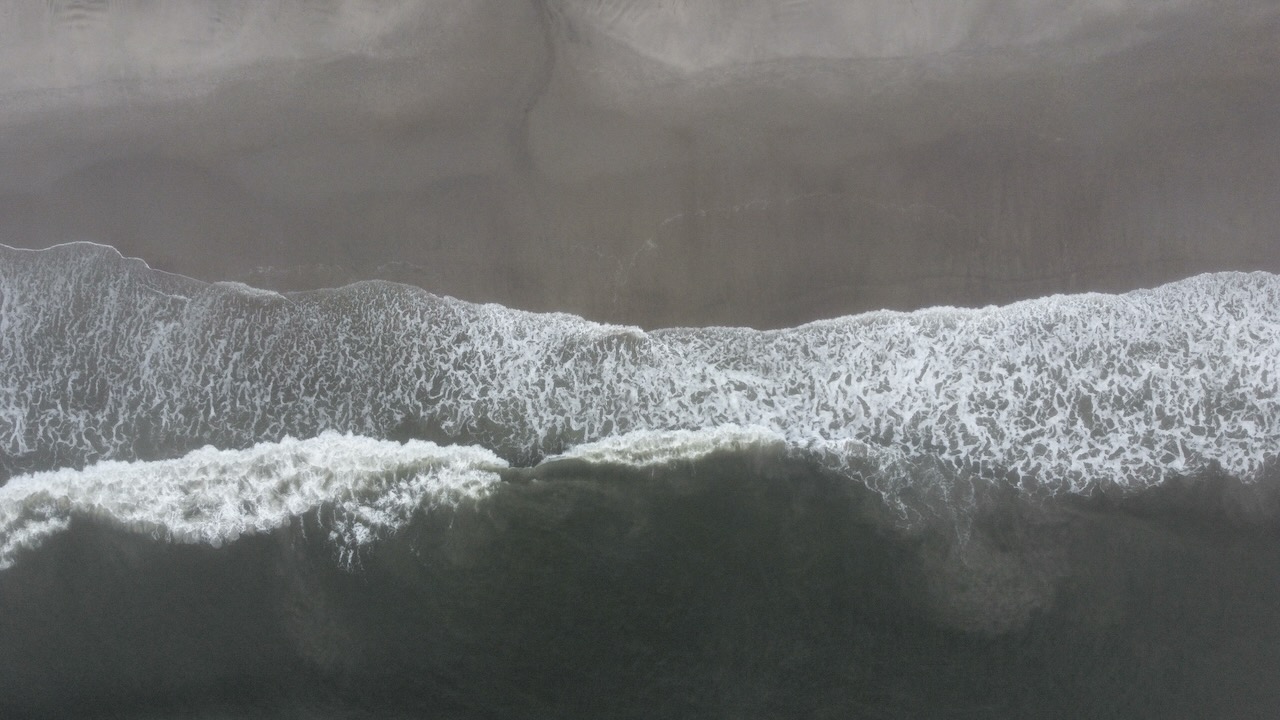 View of surf, looking downward. Image taken from drone. 