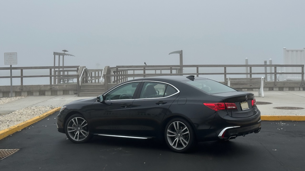 2020 Acura TLX parked in front of pier. 