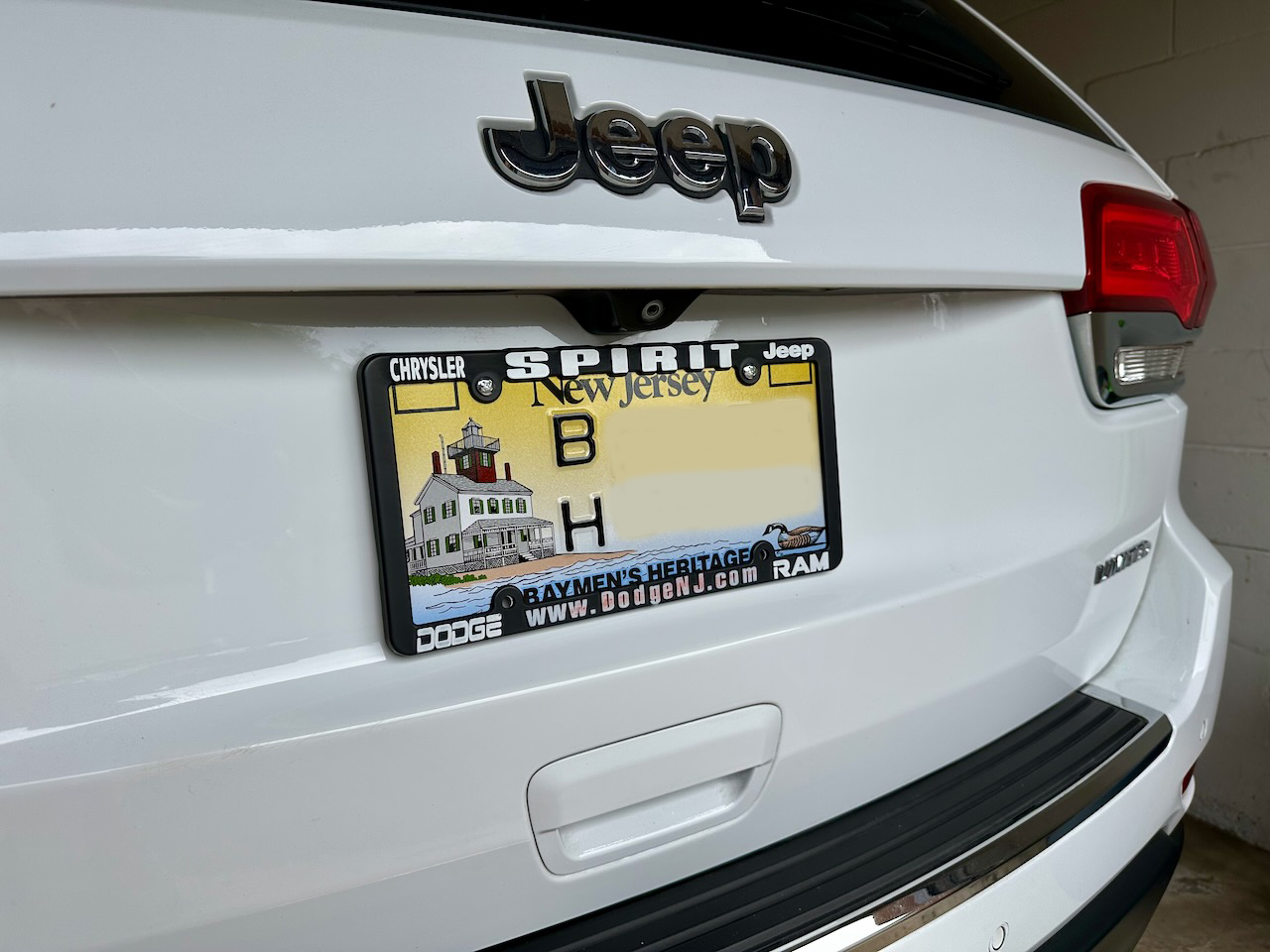 Jeep Grand Cherokee tailgate with Baymen's Heritage plates. 