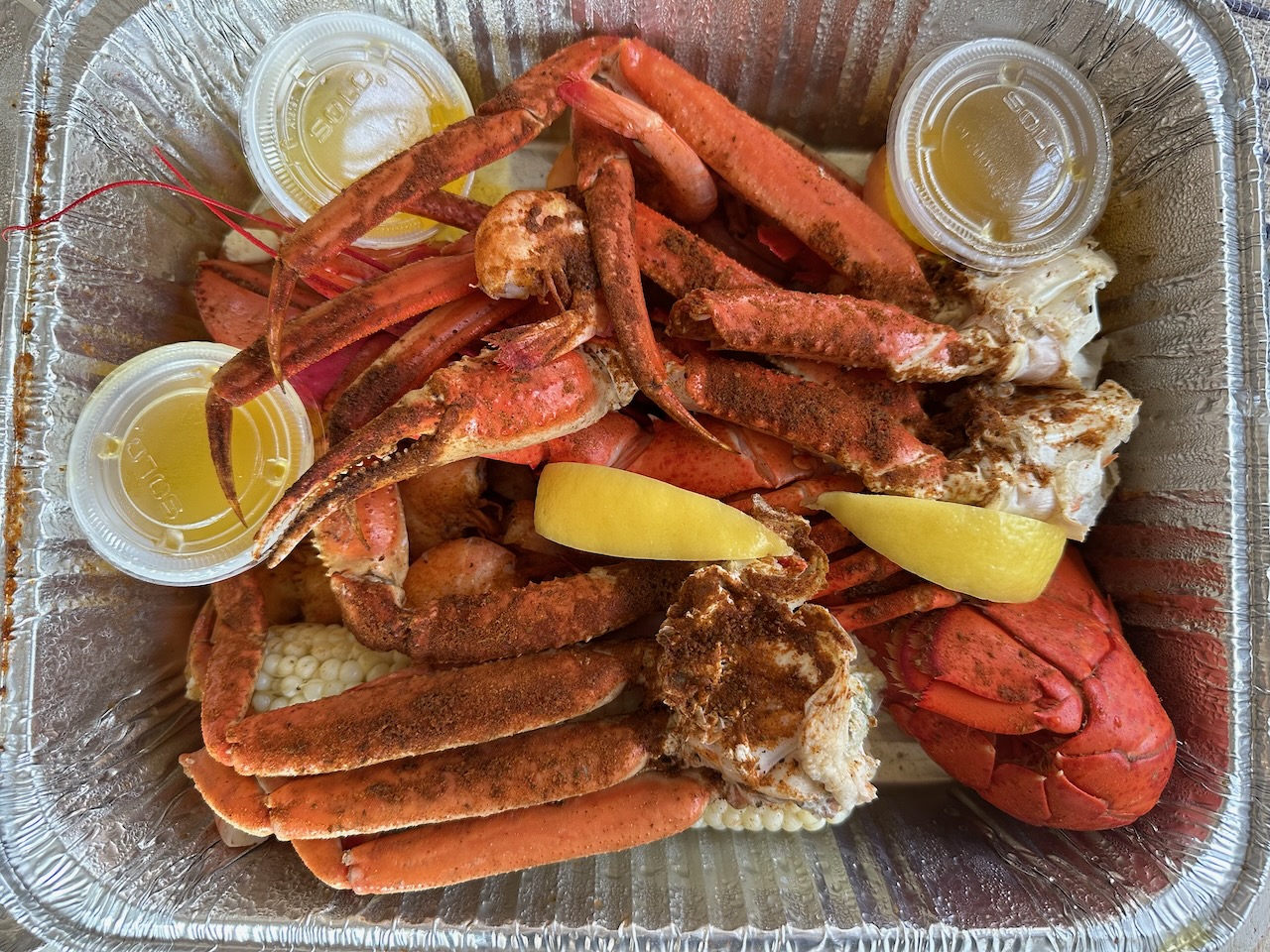 Patio Paul platter with steamed lobster tail, crab legs, and shrimp. 