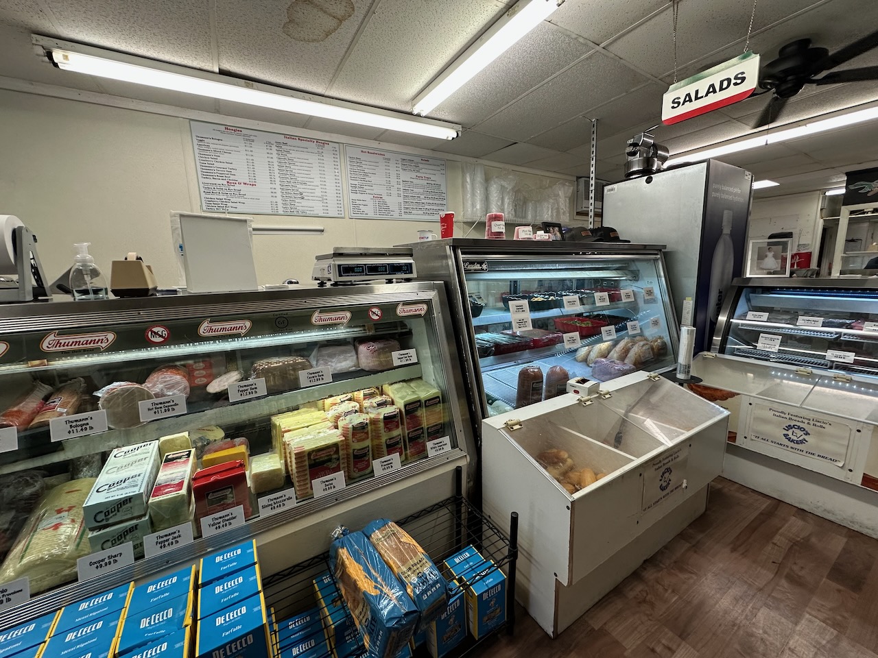 Interior of Giovanni's Deli., including lunchmeat case and deli counter. 