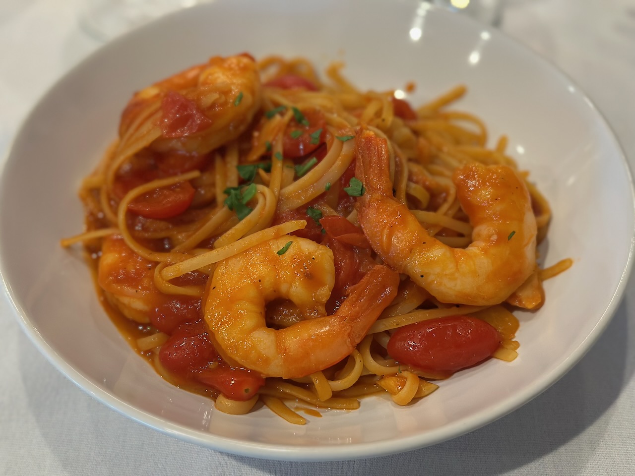 Linguine Fra Diavolo on white plate. 