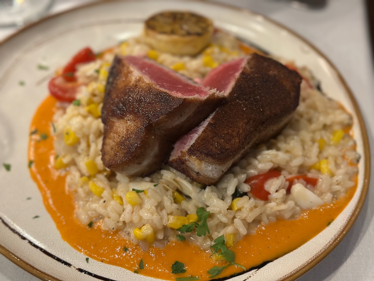 Grilled tuna served over risotto. 