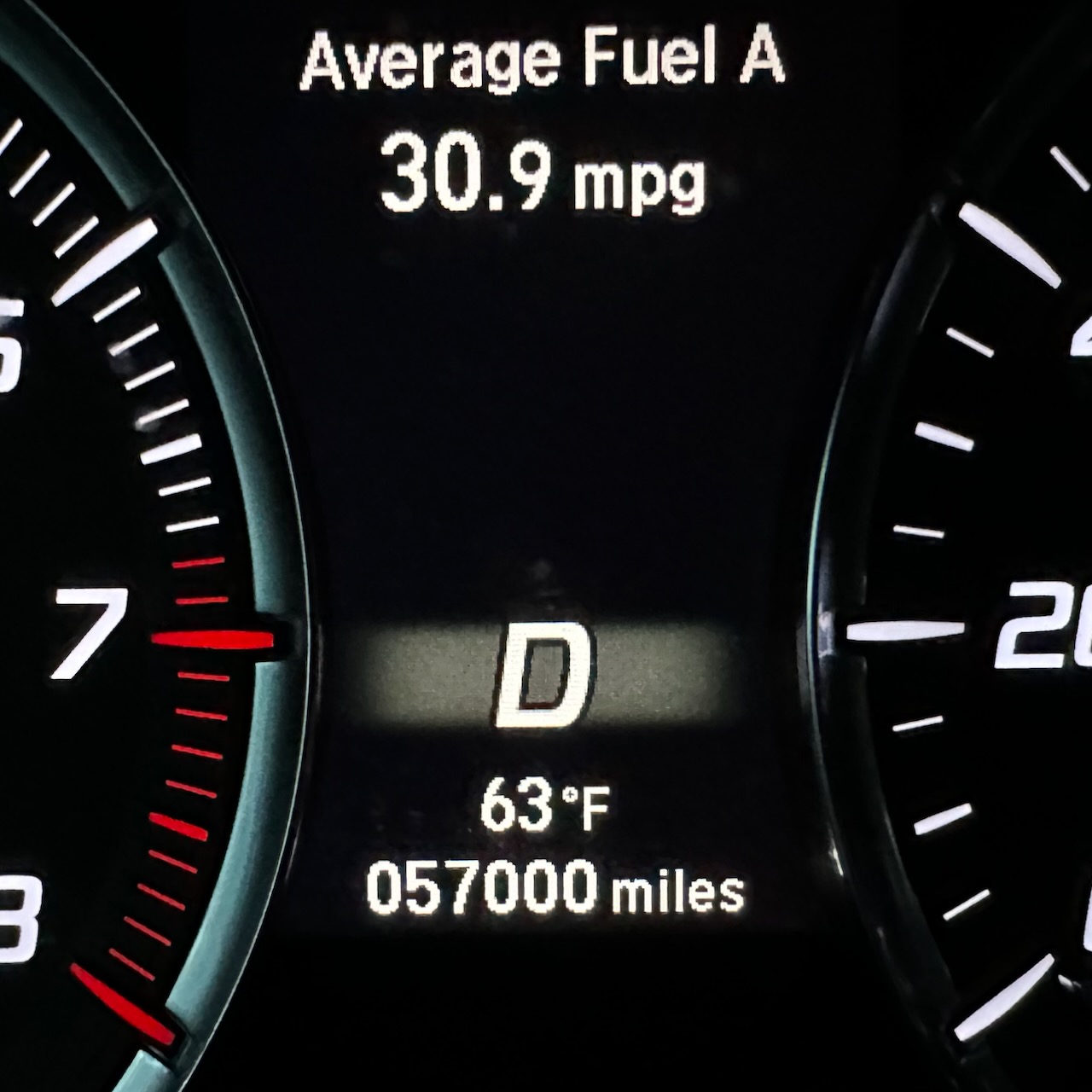 Car odometer reading 57000 miles