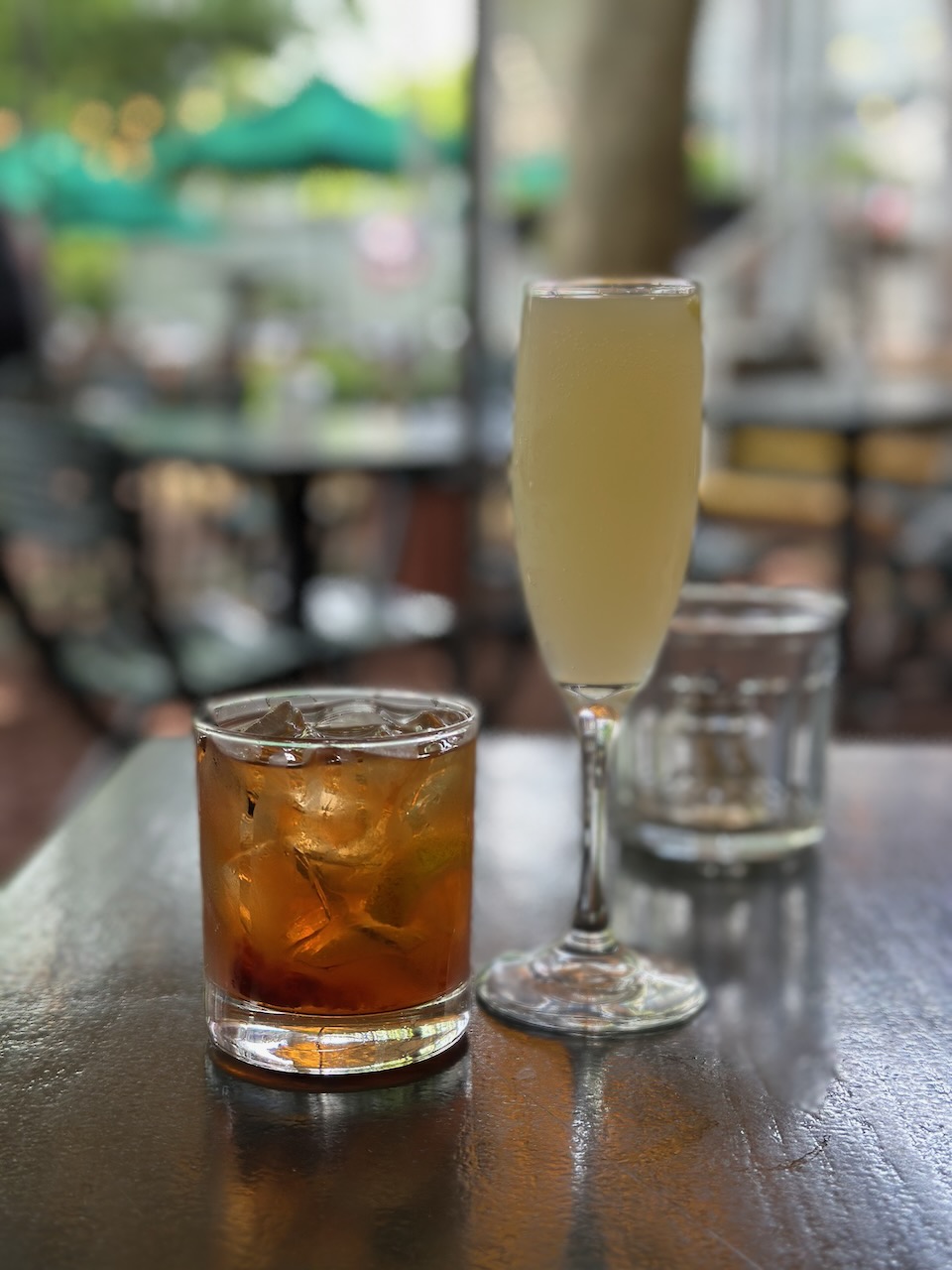 Old Fashioned and French 75 on table. 