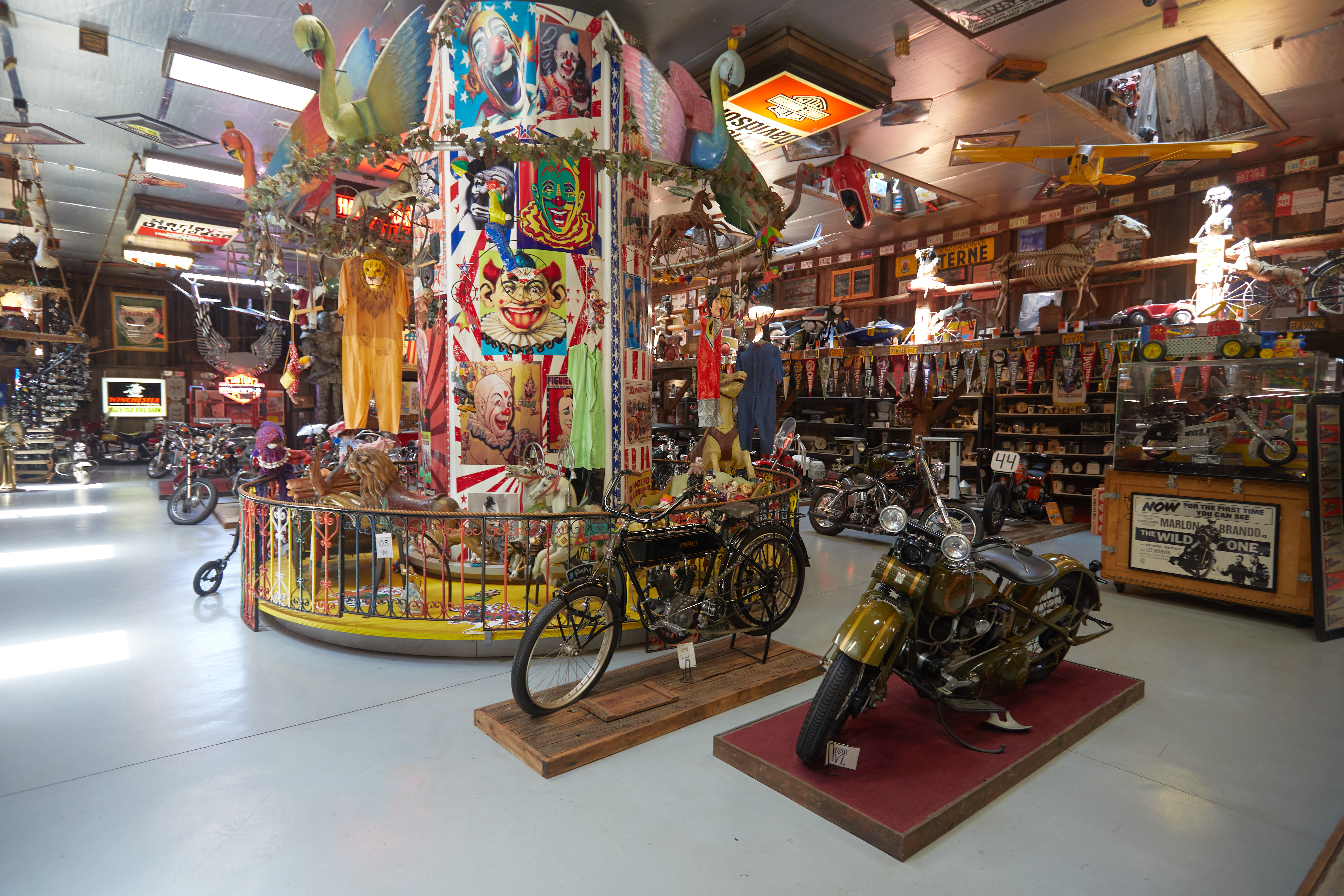 Bill's Bike Barn collection hall, with numerous motorcycles displayed around room.
