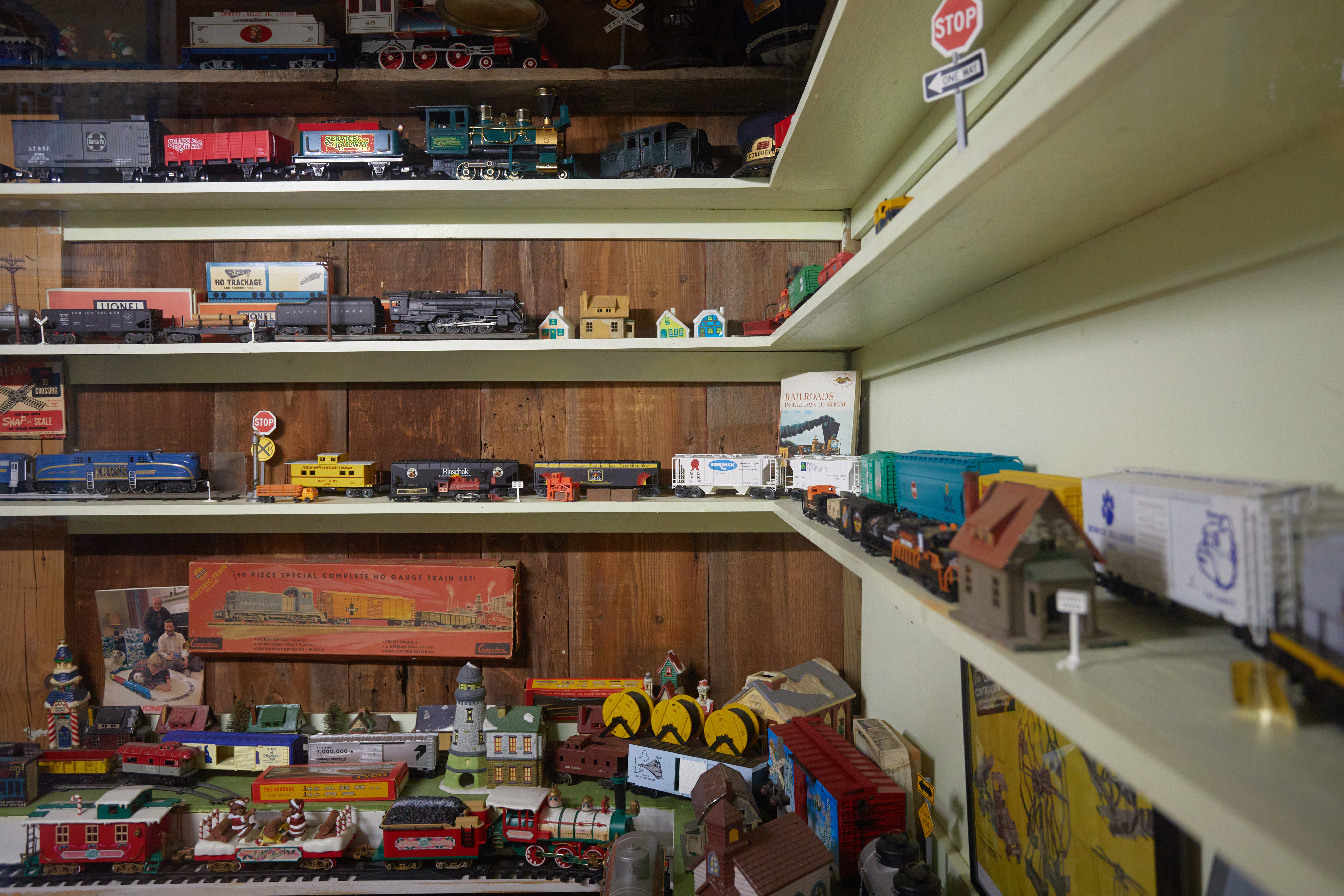 Model trains on display in store.