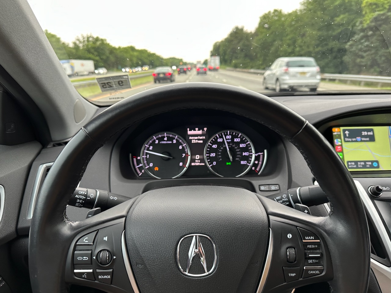 View of I-78 with dashboard and wheel of Acura TLX in foreground. 