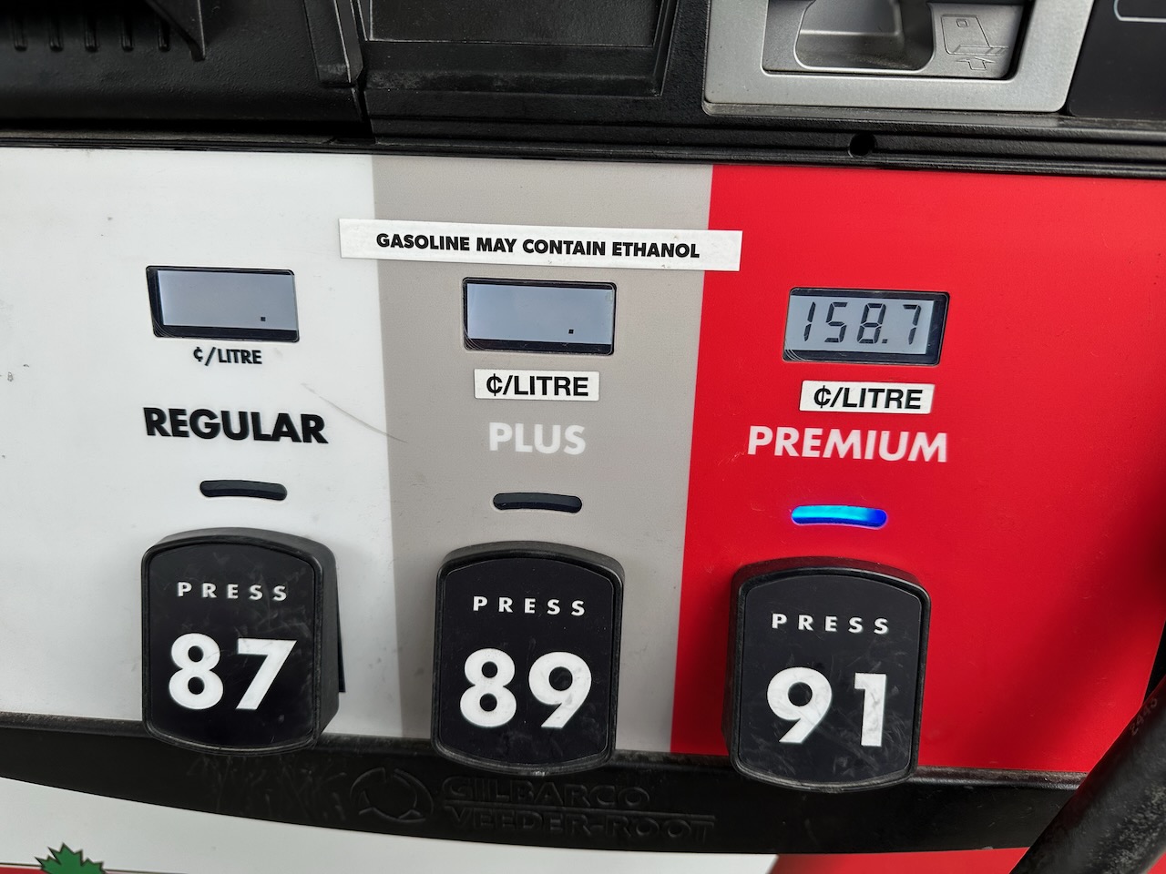 Fuel pump reading 158.7 per liter for premium fuel. 