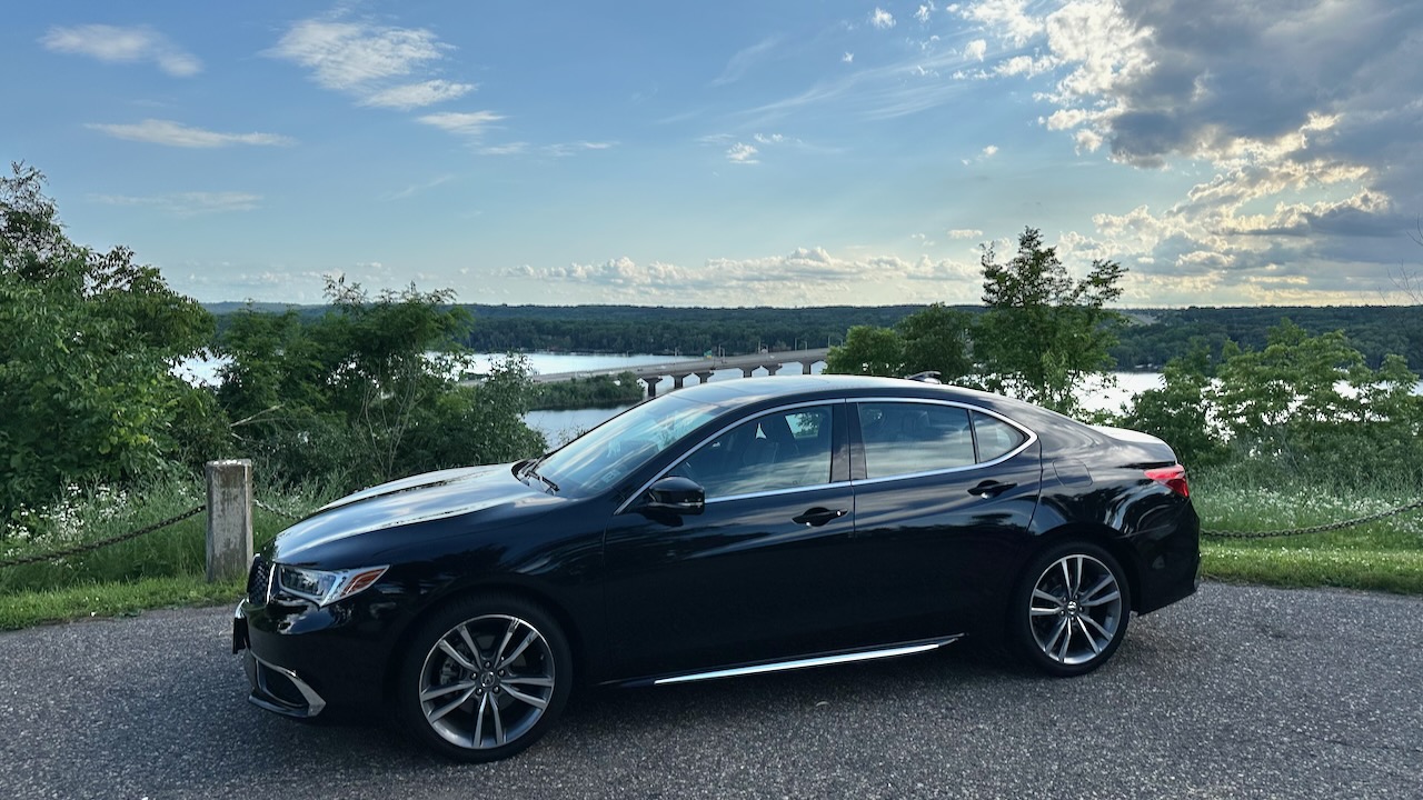 2020 Acura TLX parked in Birkmose Park with view of St. Croix River beneath.