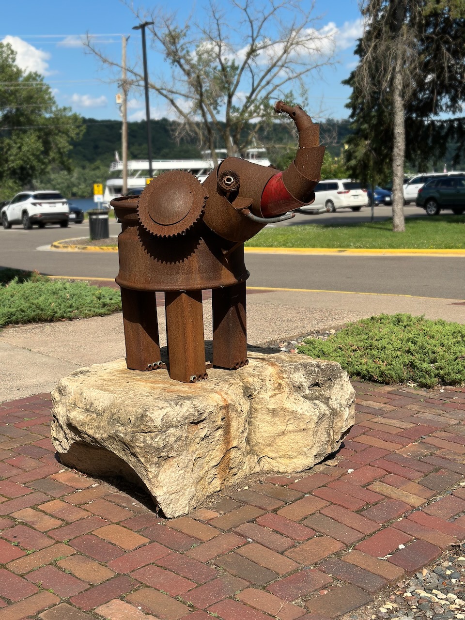 Statue of elephant made form metal on pedestal in downtown Stillwater.