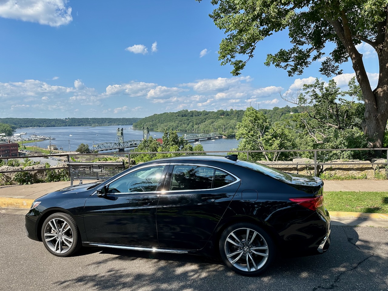 2020 Acura TLX parked in front of scenic overlook. St. Croix River and Lift Bridge are visible in background.