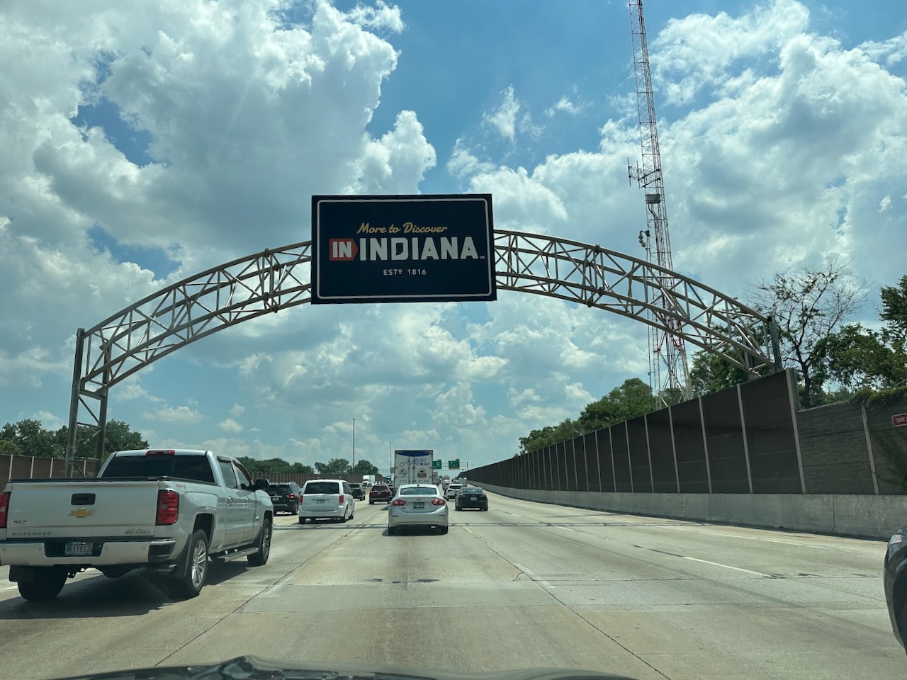 Welcome to Indiana sign over highway.