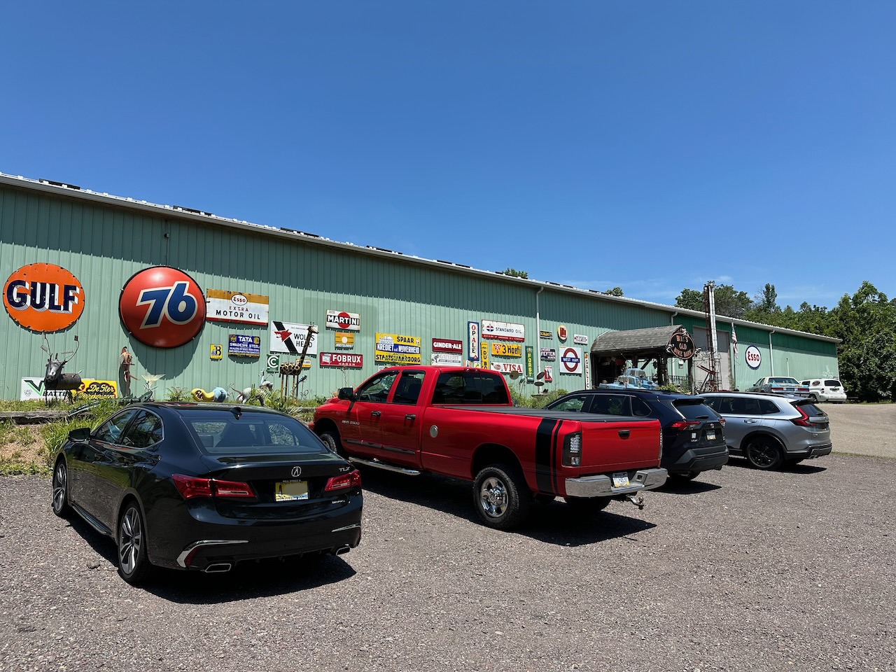 2020 Acura TLX parked in front of Bill's Bike Barn.