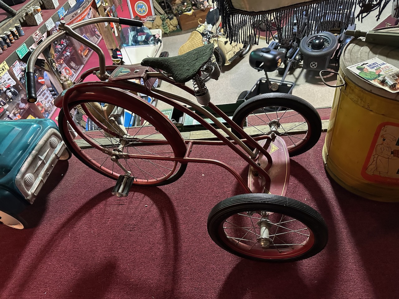 Small metal tricycle.